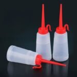 Burette d’huile plastique rouge